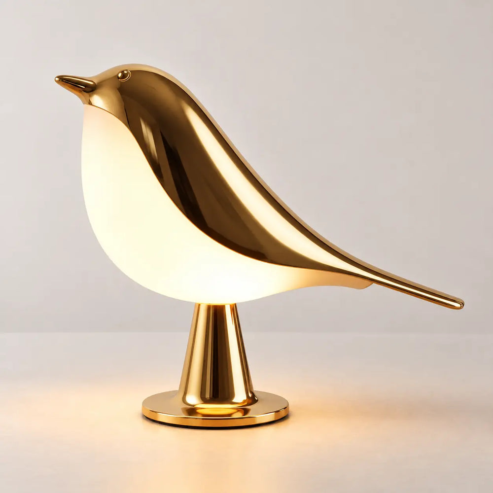 Svala fågellampa i guld